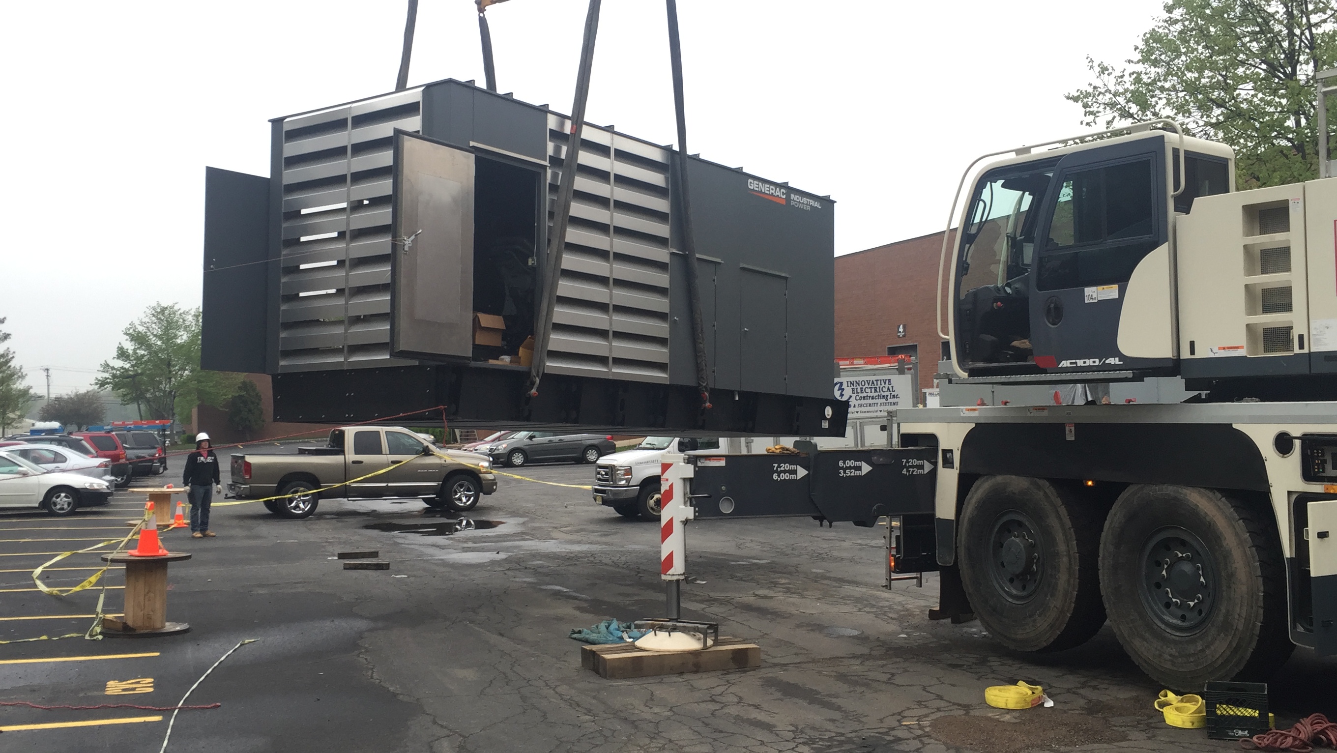 Setting the 1 Meg ( 1000kw ) Generac Generator in place with a BIG crane - Fairfield, NJ